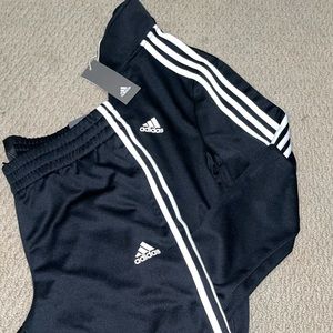 Adidas famous track suit in BLACK MEDIUM FOR BOTH